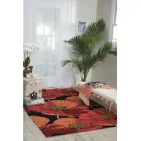 Photo of Black and Orange Floral Hand Hooked Area Rug