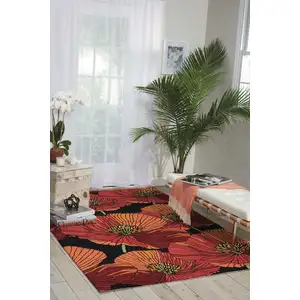 Photo of Black and Orange Floral Hand Hooked Area Rug