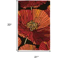 Photo of Black and Orange Floral Hand Hooked Area Rug