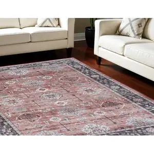 Photo of Black and Red Floral Distressed Non Skid Area Rug