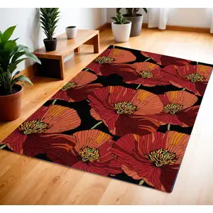 Photo of Black and Red Floral Hand Hooked Area Rug