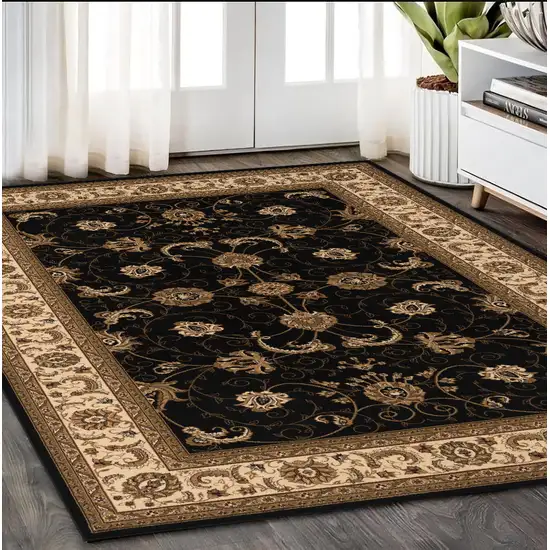 Black and Ivory Oriental Power Loom Area Rug Photo 1