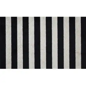 Photo of Black and Tan Wide Stripe Washable Floor Mat