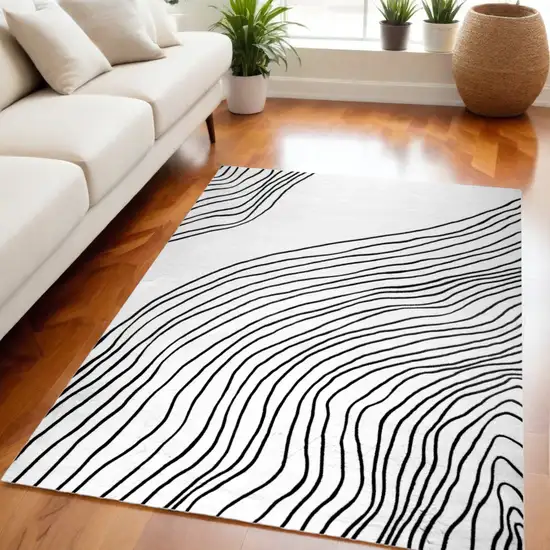 Black and White Abstract Distressed Area Rug Photo 1