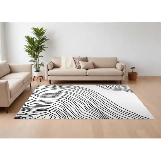 Black and White Abstract Distressed Area Rug Photo 1