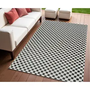 Photo of Black and White Geometric Distressed Indoor Outdoor Area Rug