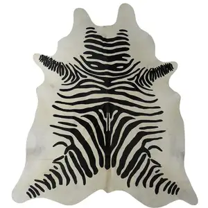 Photo of Black and White Stenciled Cowhide Rug