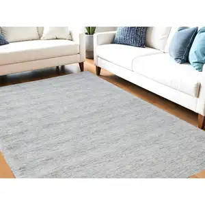 Photo of Blue Abstract Hand Woven Area Rug