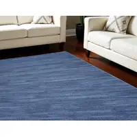 Photo of Blue Abstract Power Loom Washable Non Skid Area Rug