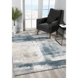 Photo of Blue And Beige Abstract Washable Non Skid Area Rug