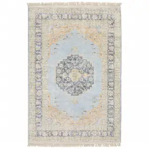 Photo of Blue And Beige Oriental Hand Loomed Stain Resistant Area Rug With Fringe