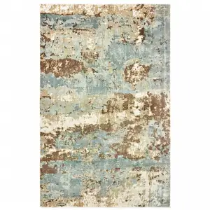 Photo of Blue And Brown Abstract Hand Loomed Stain Resistant Area Rug