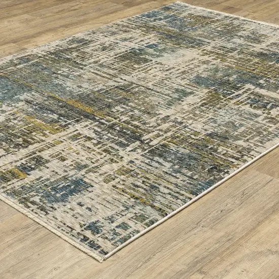 Blue And Gold Abstract Area Rug With Fringe Photo 6