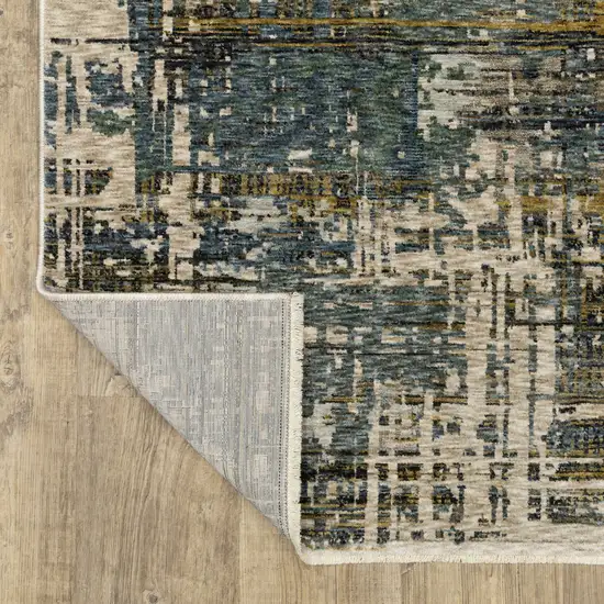 Blue And Gold Abstract Area Rug With Fringe Photo 9