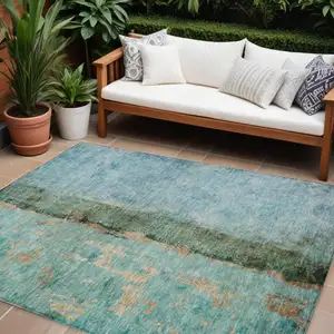 Photo of Blue And Gold Abstract Washable Indoor Outdoor Area Rug