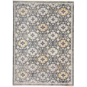 Photo of Blue And Gold Floral Stain Resistant Area Rug