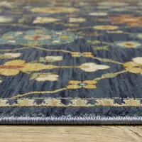 Photo of Blue And Gold Oriental Area Rug With Fringe