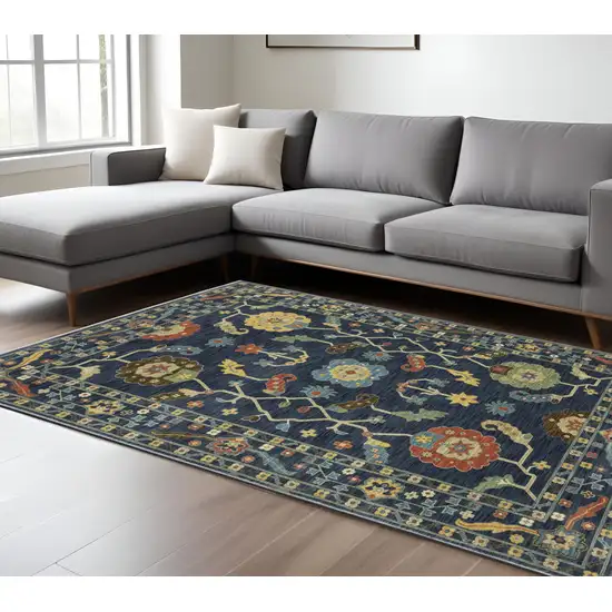 Blue And Gold Oriental Area Rug With Fringe Photo 1