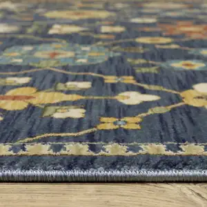 Photo of Blue And Gold Oriental Area Rug With Fringe