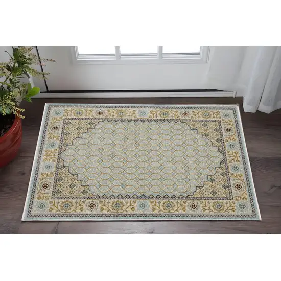 Blue And Gold Oriental Area Rug With Fringe Photo 1