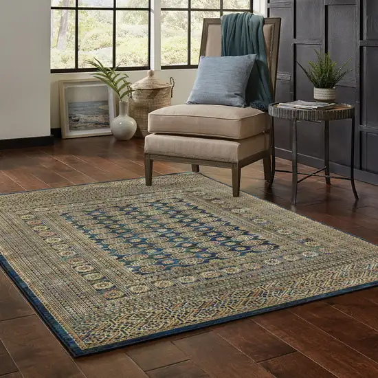 Blue And Gold Oriental Power Loom Stain Resistant Area Rug Photo 9