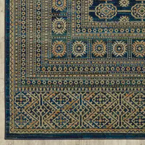 Photo of Blue And Gold Oriental Power Loom Stain Resistant Area Rug