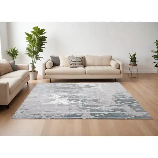 7' X 9' Blue And Gray Abstract Washable Non Skid Area Rug Photo 1