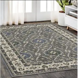 Photo of Blue And Gray Oriental Area Rug With Fringe