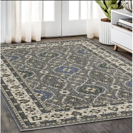 Blue And Gray Oriental Area Rug With Fringe Photo 1