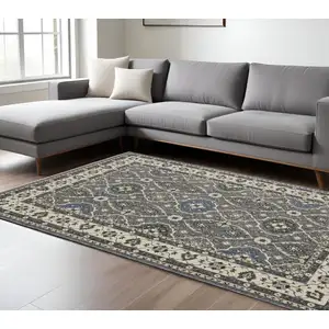 Photo of Blue And Gray Oriental Area Rug With Fringe