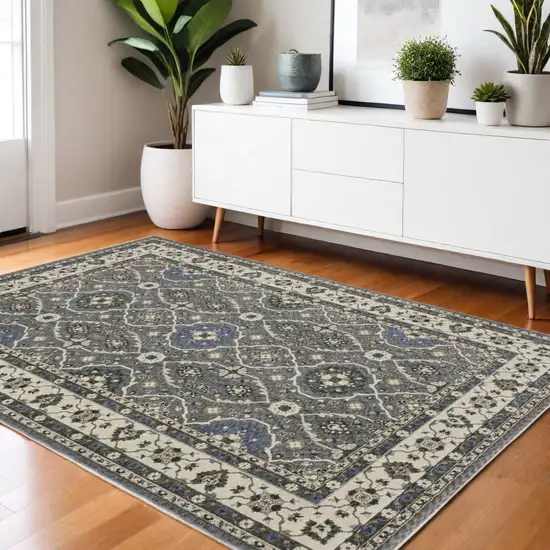 Blue And Gray Oriental Area Rug With Fringe Photo 1