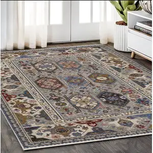 Photo of Blue And Gray Oriental Area Rug With Fringe