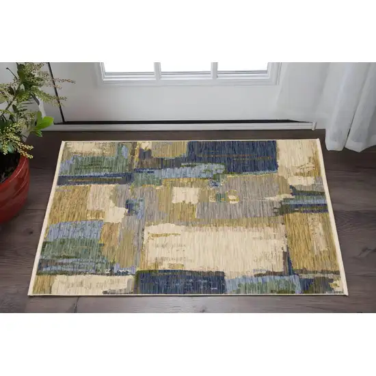 Blue And Green Abstract Area Rug With Fringe Photo 1