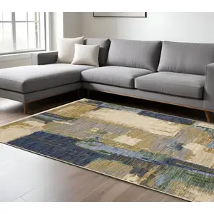 Photo of Blue And Green Abstract Area Rug With Fringe