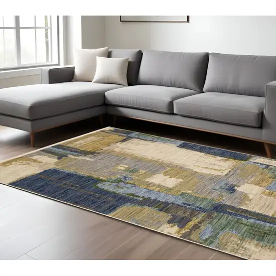 Blue And Green Abstract Area Rug With Fringe Photo 1