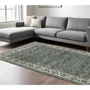 Photo of Blue And Green Floral Area Rug With Fringe