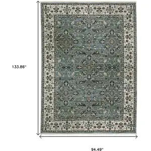 Photo of Blue And Green Floral Area Rug With Fringe