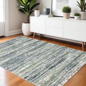 Photo of Blue And Green Striped Distressed Area Rug