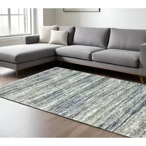 Photo of Blue And Green Striped Distressed Area Rug