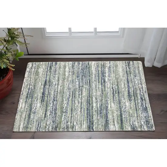 Blue And Green Striped Distressed Area Rug Photo 1