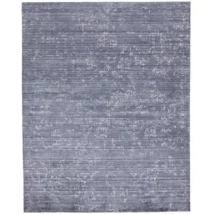 Photo of Blue And Ivory Abstract Hand Woven Area Rug