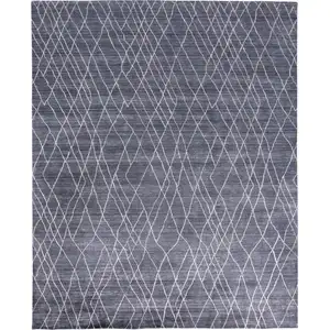 Photo of Blue And Ivory Abstract Hand Woven Area Rug