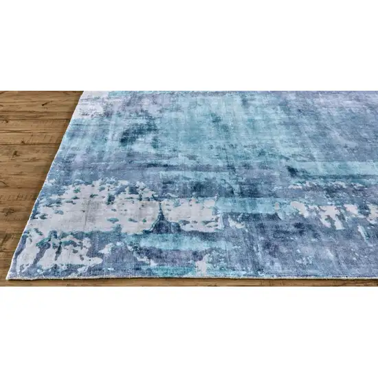 Blue And Ivory Abstract Hand Woven Area Rug Photo 1