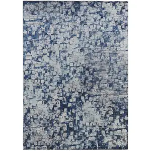 Photo of Blue And Ivory Abstract Power Loom Distressed Stain Resistant Area Rug