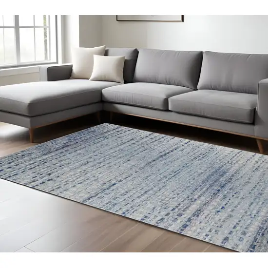 Blue and Ivory Abstract Power Loom Non Skid Area Rug Photo 1