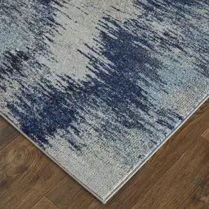 Photo of Blue And Ivory Abstract Power Loom Stain Resistant Area Rug