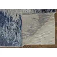 Photo of Blue And Ivory Abstract Power Loom Stain Resistant Area Rug