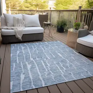 Photo of Blue And Ivory Abstract Washable Indoor Outdoor Area Rug