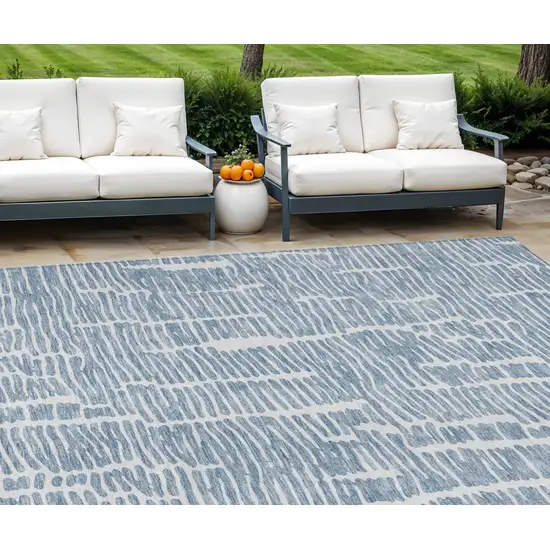 Blue And Ivory Abstract Washable Indoor Outdoor Area Rug Photo 1