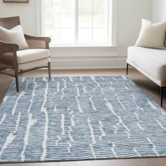 Blue And Ivory Abstract Washable Indoor Outdoor Area Rug Photo 9